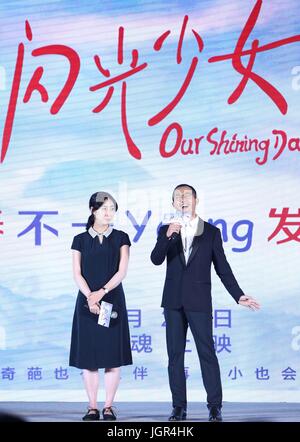 (170710) -- BEIJING, July 10, 2017 (Xinhua) -- Director Wang Ran (R) and screenwriter Bao Jingjing attend a press conference on film 'Our Shining Days' in Beijing, capital of China, July 10, 2017. The film will hit the big screens on July 20.  (Xinhua/Gao Jing) (zkr) Stock Photo