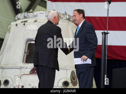 In this photo released by the National Aeronautics and Space Administration (NASA) United States Vice President Mike Pence shakes hands with Acting NASA Administrator Robert Lightfoot before addressing NASA employees, Thursday, July 6, 2017, at the Vehicle Assembly Building at NASA’s Kennedy Space Center (KSC) in Cape Canaveral, Florida. The Vice President thanked employees for advancing American leadership in space, before going on a tour of the center that highlighted the public-private partnerships at KSC, as both NASA and commercial companies prepare to launch American astronauts from the  Stock Photo