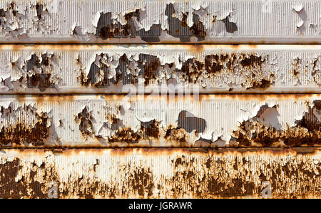 Rusty garage door. Vintage style. Ideal for backgrounds. Stock Photo
