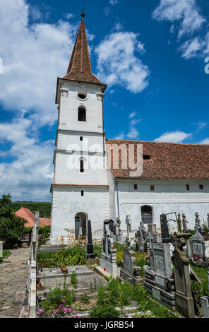 Small Holy Trinity Church in Sibiel village famous from traditional Saxon architecture in Saliste commune, Transylvania in Romania Stock Photo