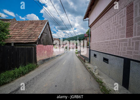 Road in small village of Sibiel famous from traditional Transylvanian Saxons architecture, Saliste commune in Transylvania region in Romania Stock Photo