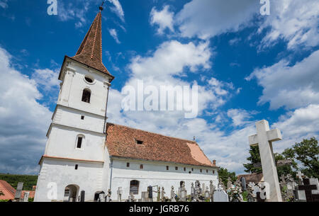 Small Holy Trinity Church in Sibiel village famous from traditional Saxon architecture in Saliste commune, Transylvania in Romania Stock Photo