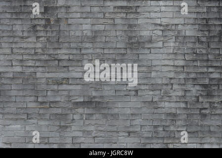 Old brick wall background. Grunge texture. Black wallpaper. Dark surfaceAbstract weathered texture stained old stucco light gray and aged paint white  Stock Photo