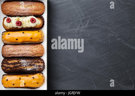 Box of french eclairs Stock Photo