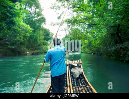 bamboo raft driver in Wuyishan, China Stock Photo