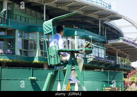 LONDON - JULY 5TH 2017: A tennis umpire judges the match between Naomi Osaka and Barbora Strycova on Day 3 of Wimbledon 2017. Stock Photo