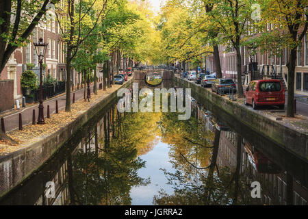 Amsterdam, Netherlands – October 30, 2016: The canal Oudezijds Achterburgwal in the Red light District of the old center of Amsterdam Stock Photo