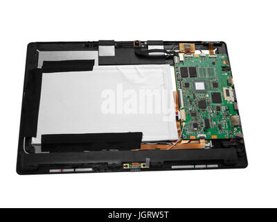 Disassembled tablet computer. Isolated on white background. Stock Photo