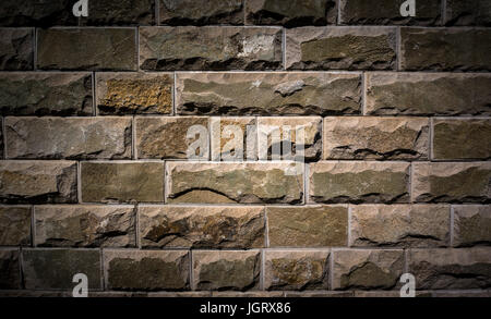 Brick stone wall for background. The texture of the stone. Stock Photo