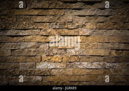 The new design of modern wall. Brick stone wall for background. The texture of the stone. Stock Photo
