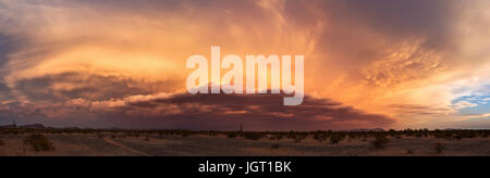Arizona monsoon sunset sky panorama as a dust storm approaches Stock Photo