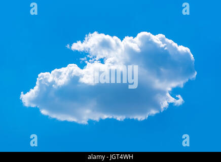 Lonely white Cumulus cloud on a solid blue background of the heavens Stock Photo
