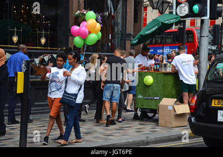 London, UK, 08/07/2017 Clapham Junction KFC chi cken & Robinsons squash street tasting  promotion. Stock Photo