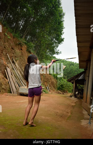 Girl playing outside Stock Photo