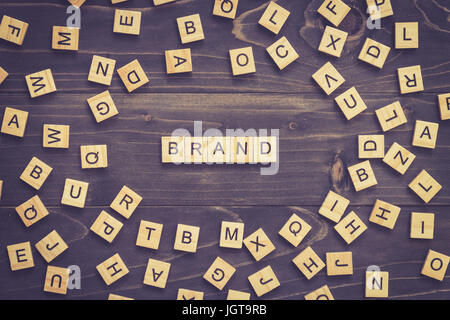 Brand word wood block on table for business concept. Stock Photo