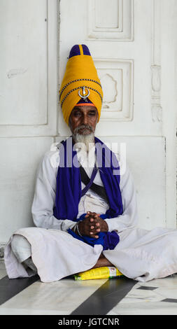 Amritsar, India - Jul 25, 2015. A Sikh man meditating at the Golden Temple in Amritsar, India. Stock Photo