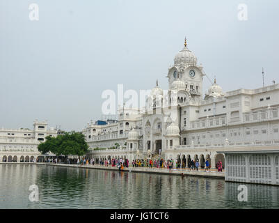 Amritsar, India - Jul 25, 2015. People visit the main palace at the Golden Temple in Amritsar, India. Stock Photo