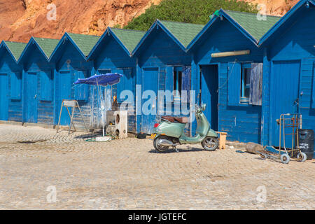 ALBUFEIRA, PORTUGAL - AUGUST 25, 2016: Typical small fishermen wooden houses in Olhos de Agua, Algarve, Portugal. Stock Photo