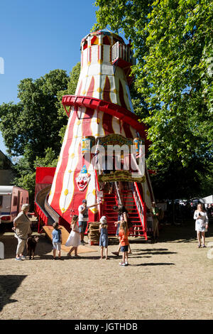 A Helter Skelter at the annual Barnes Village Fair held on Barnes Common in SW London, UK Stock Photo