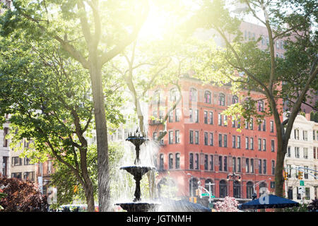 Summer scene with fountain and historic buildings in Madison Square Park in Manhattan, New York City NYC Stock Photo