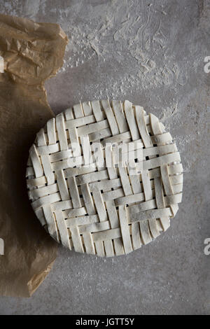 A lattice fruit pie ready for cooking Stock Photo