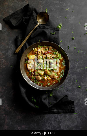 Chicken curry on a dark background Stock Photo