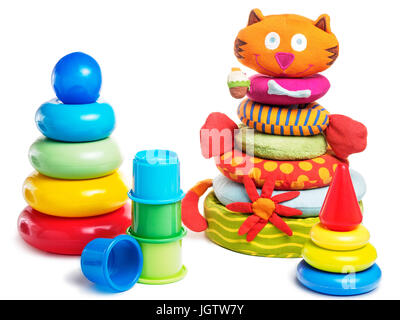 Set of different baby pyramid toys - plastic rings pyramid, cloth pyramid, plastic cup pyramid. Isolated on white with clipping path. Stock Photo