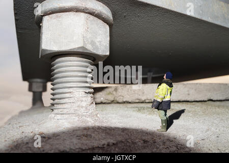 Tiny person looking up at a gigantic structure, created by the Gods? Stock Photo