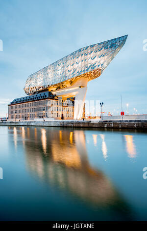 ANTWERPEN, BELGIUM - June 02, 2017: Night view on the illuminated Port House building designed by Zaha Hadid architect in 2009 in Antwerpen city, Belg Stock Photo