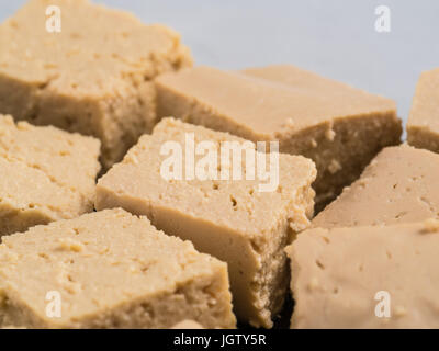 Close up view of soy cheese tofu diced. Copy space. Stock Photo