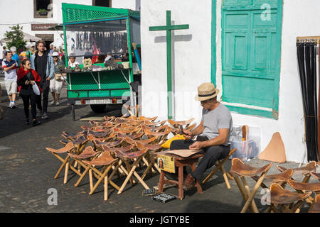 Canarian craftsman produces camp-chairs wit leather seats, weekly sunday market, Teguise, Lanzarote island, Canary islands, Spain, Europe Stock Photo