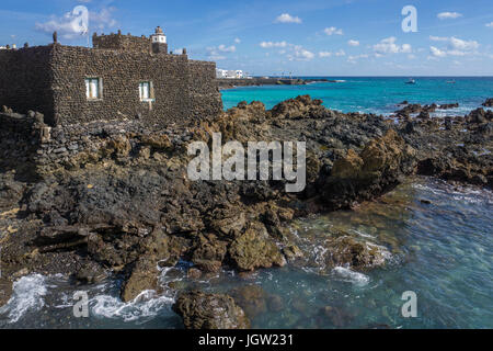 Residential houses build with lava stones, Punta Mujeres, fishing village north of Lanzarote island, Canary islands, Spain, Europe Stock Photo
