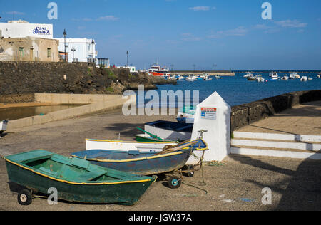 Fishing harbour of the village Orzola, start point for ferry roundtrips to La Graciosa island, Lanzarote, Canary islands, Europe Stock Photo