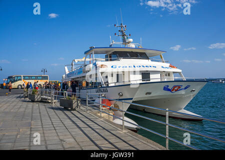 Ferry at fishing harbour Orzola, start point for roundtrips to La Graciosa island, Lanzarote, Canary islands, Europe Stock Photo
