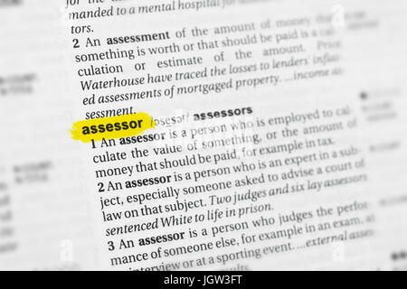 Highlighted English word 'assessor' and its definition at the dictionary. Stock Photo