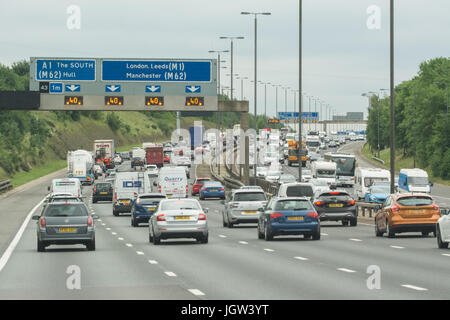 Traffic On Motorway Interchange A1-a10 And Overhead Route Information 