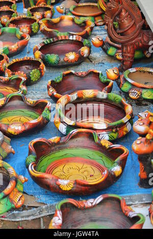 Earthenware pottery on display for sale at a local fair Stock Photo - Alamy