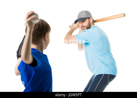 father ready to hit the ball by baseball bat isolated on white Stock Photo