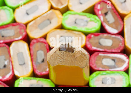 one sharpened carpenter pencil among many with selective focus on the point Stock Photo