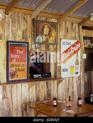 A table and dj booth at Jack Sprat restaurant. Sprats is located at Jake's Resort, a popular Treasure Beach hotel. St. Elizabeth Parish, Jamaica Stock Photo