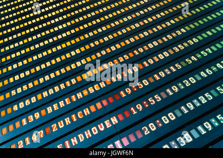 Flight Departure And Arrivals Of Planes Information Board In Airport Terminal Stock Photo