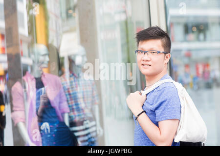 Man window shopping Stock Photo