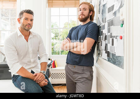 Portrait of two male designers in creative studio Stock Photo