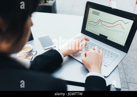 Businesswoman using laptop Stock Photo