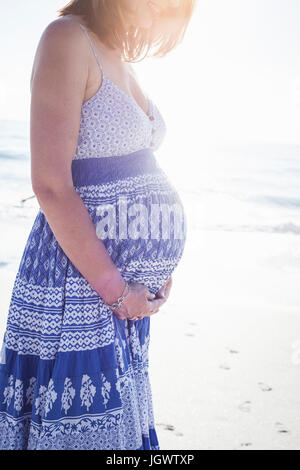 Pregnant woman on beach, Cape Town, South Africa Stock Photo