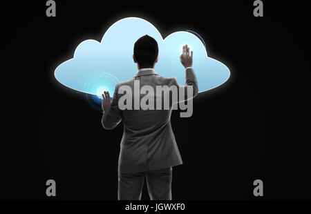 businessman working with virtual cloud projection Stock Photo