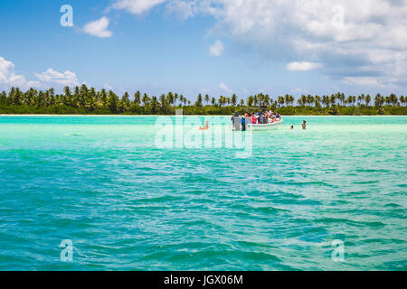 Boat with tourists in a natural sea pool. Dominican Republic. Stock Photo