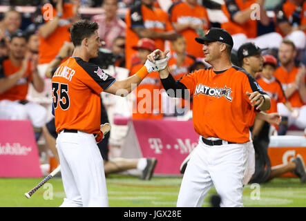 Miami, Florida, USA. 13th Dec, 2012. WILL VRAGOVIC | Times.Los Angeles Dodger Cody Bellinger, left, is congratulated by his father Clay during the first round of Major League Baseball's Home Run Derby, Monday, July 10, 2017 in Miami. Credit: Will Vragovic/Tampa Bay Times/ZUMA Wire/Alamy Live News Stock Photo