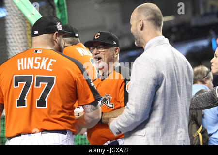 Miami, Florida, USA. 11th July, 2017. WILL VRAGOVIC | Times.Chicago Cubs Manager Joe Maddon shares a laugh with Cubs assistant hitting coach Eric Hinske, left, and an unidentified individual during batting practice prior to the All-Star game at Marlins Park in Miami, Fla. on Tuesday, July 11, 2017. Credit: Will Vragovic/Tampa Bay Times/ZUMA Wire/Alamy Live News Stock Photo