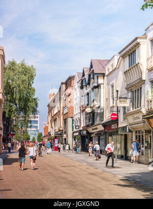 20 June 2017: Exeter, Devon, England, UK - Shopping in the High Street on a fine summer day. Stock Photo